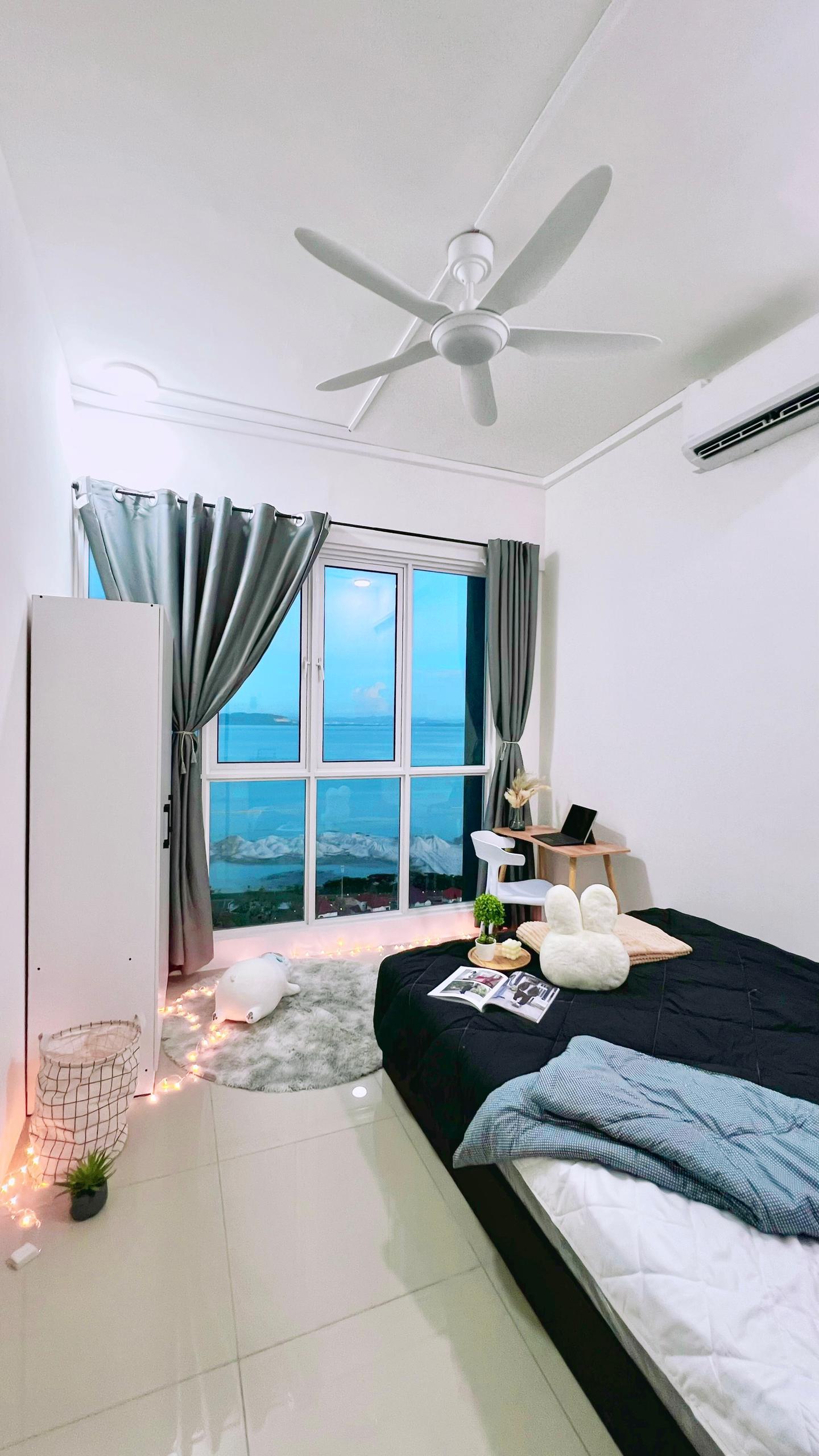 Medium room for rent in Bayan Lepas with bed, air-cond, wardrobe, and window